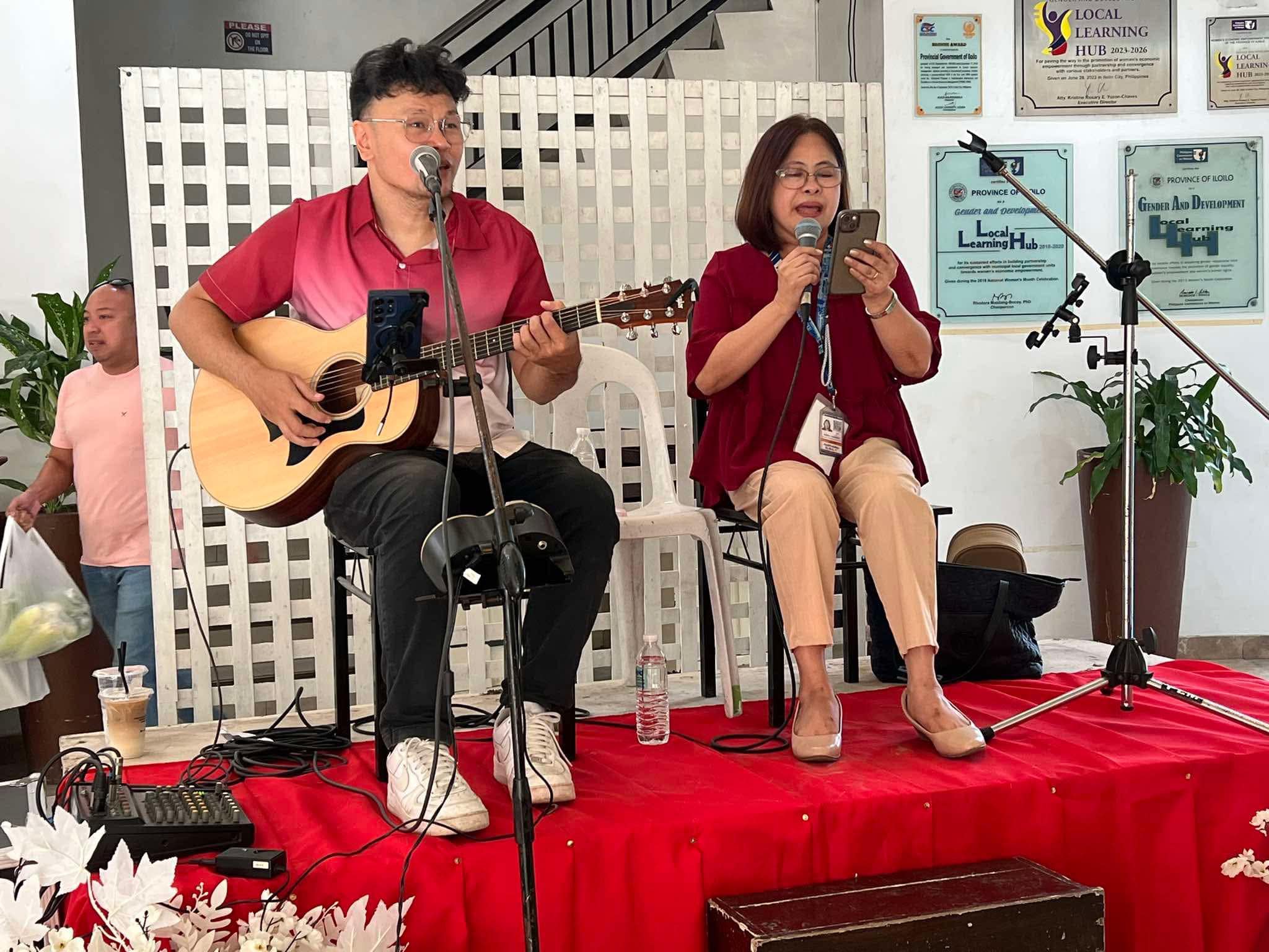 Atty Coy singing during Valentine's Day